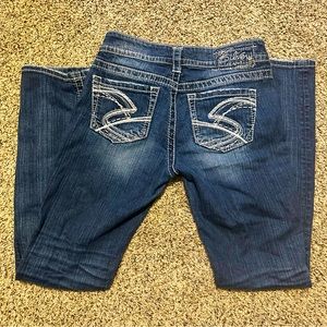 Silver Suki Straight leg jeans. Size 27/32.